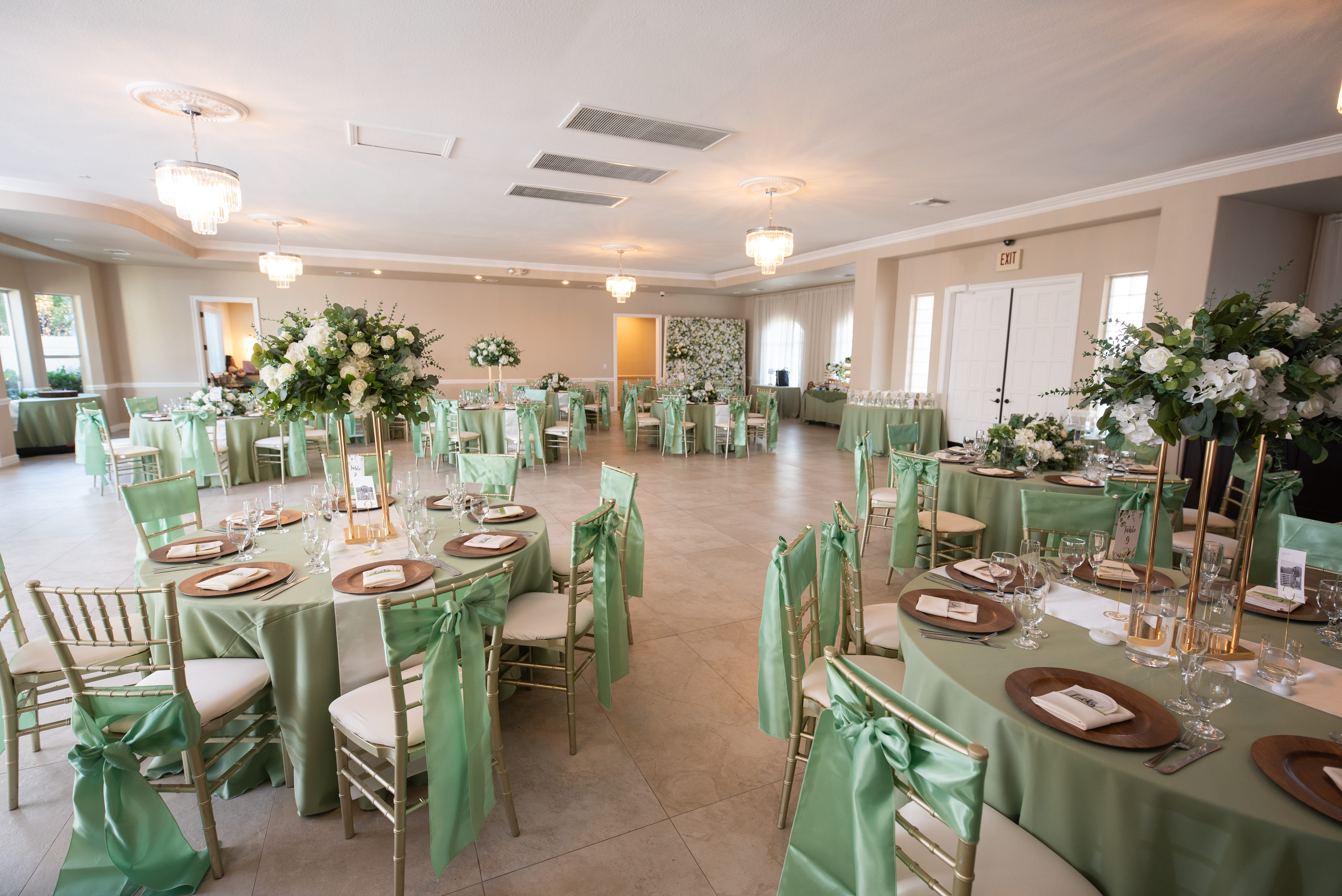 Elegant reception setup with green linens in Terrace Room Las Vegas wedding venue