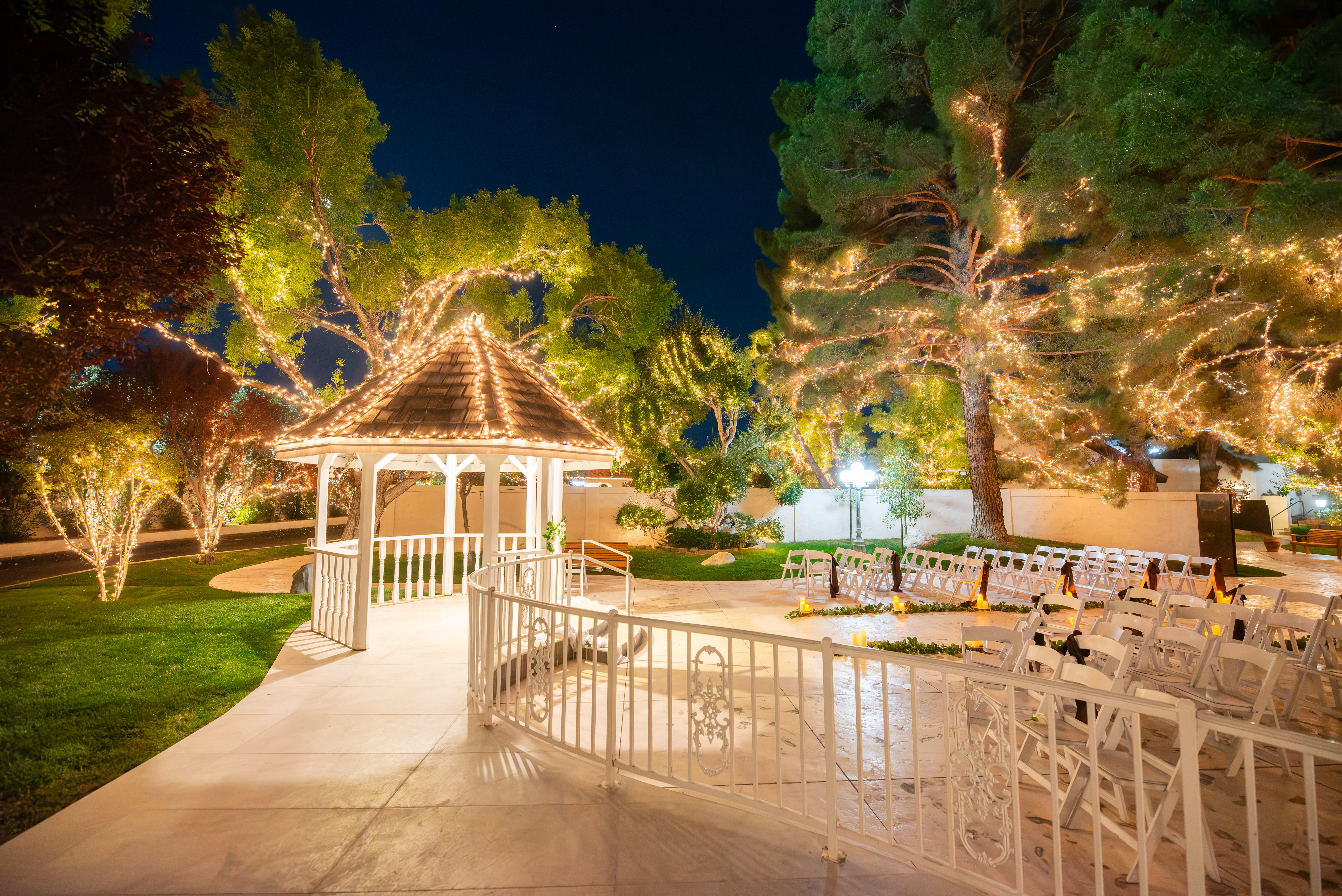 Illuminated gazebo and reception area at night in Las Vegas wedding venue